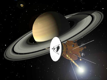 Кассини летит над Сатурном. Изображение NASA